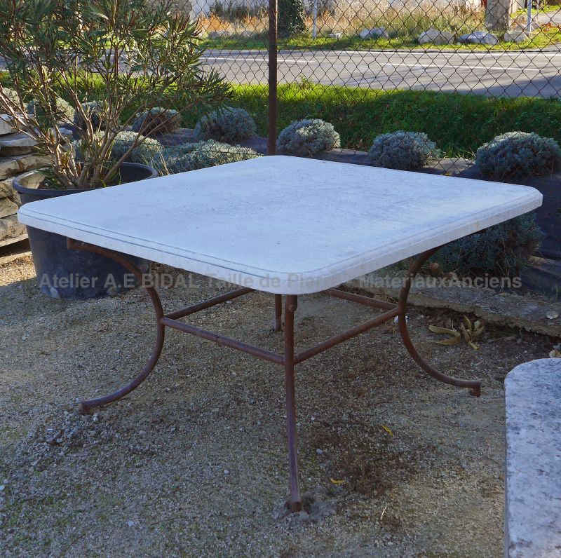 Outdoor stone and iron table - Designer garden furniture by Alain BIDAL Antique Materials in Provence.