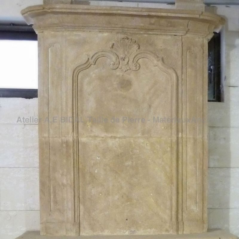 18th century fireplace with overmantle- an old fireplace recovered in a French monastery.