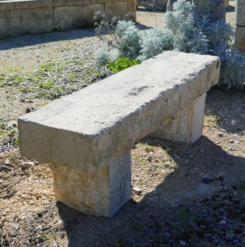Small natural stone garden bench by the Antique Materials in Provence Alain Bidal