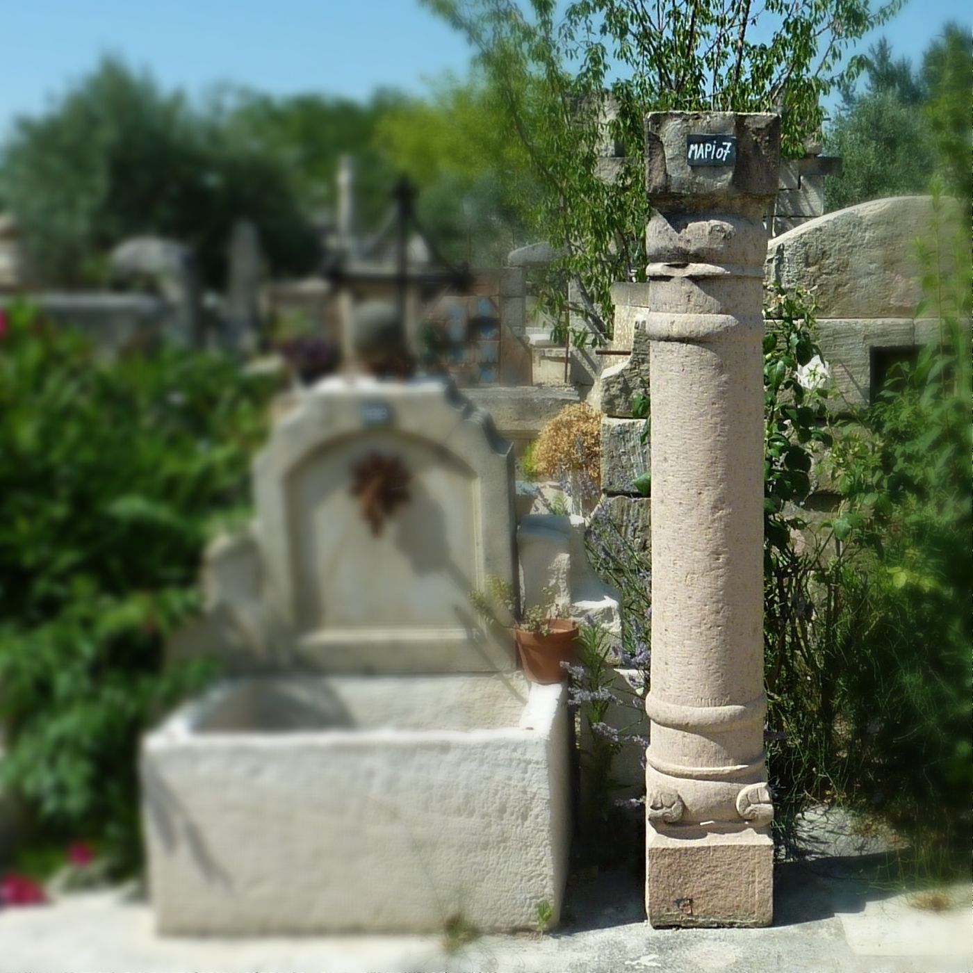 Beautiful old pillar - old column exposed in our park of old decoration elements made of old materials.
