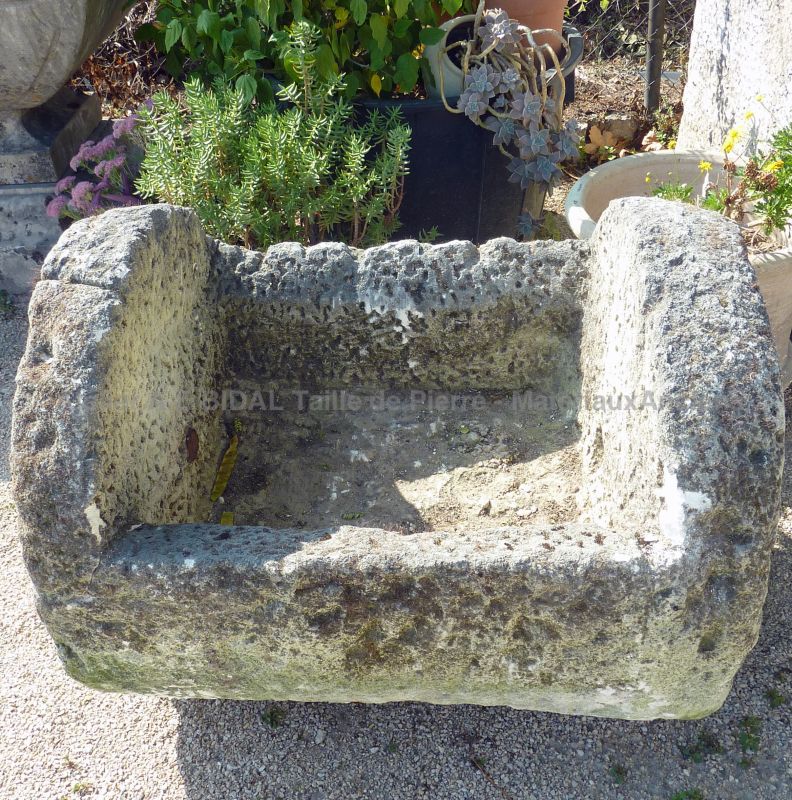 Antique trough in stone for a great outdoor design