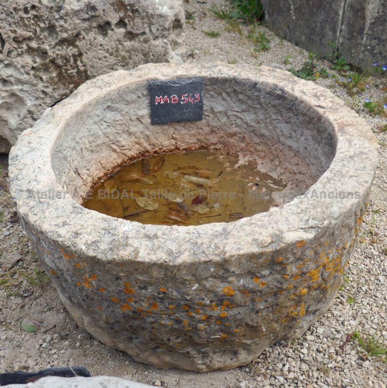 Ancient round stone trough as a rustic and robust planter - Antique Materials in Provence Alain BIDAL
