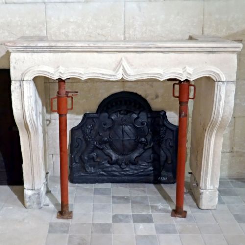 Large Louis XV stone fireplace for sale among a wide choice of antique mantels at Alain BIDAL.