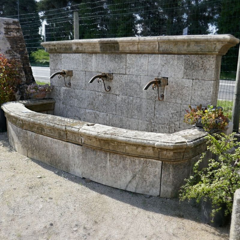 Stunning garden fountain made of natural stone ǀ An exceptional wall fountain for sale at Atelier AE Bidal