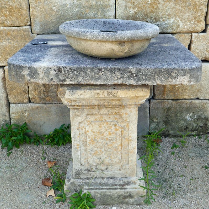Detail of the small table in stone on our large garden fountain in stone and metal - Alain Bidal Antique Materials in Provence