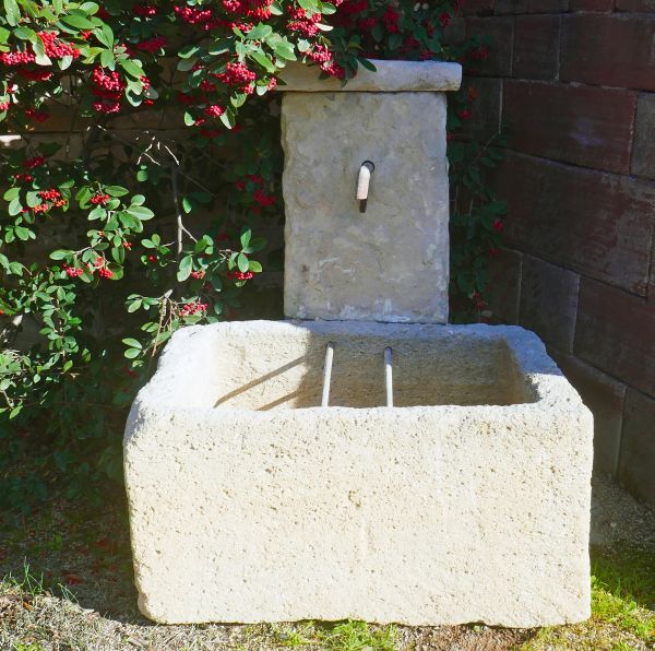 Garden fountain in reclaimed weathered stones with old trough for sale at Atelier Alain Bidal (Provence)
