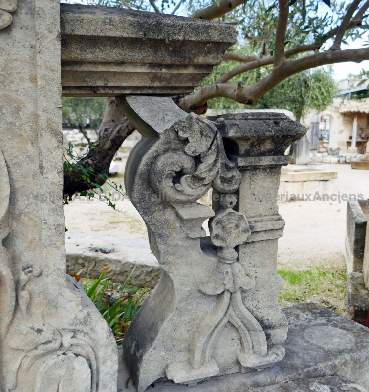 Detail of a hand-carved stone corbel on our ancient stone fountain