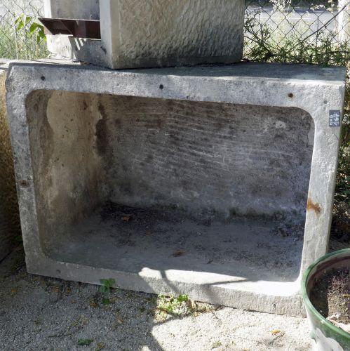 Large antique stone trough for sale at Alain Bidal Antique Materials in Provence.