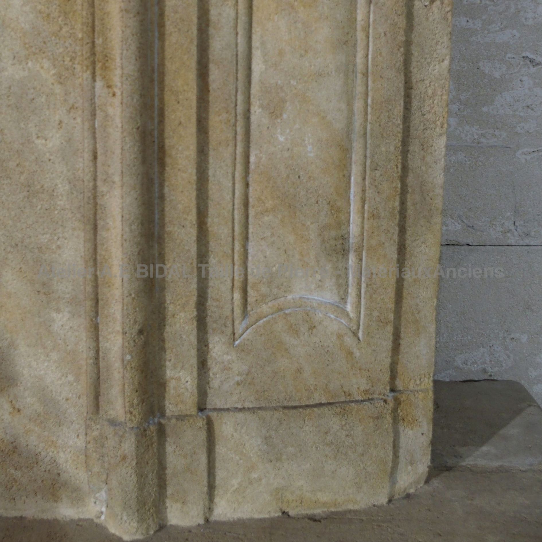 Fireplace with overmantle, entirely decorated with sculptures and carefully designed moldings.