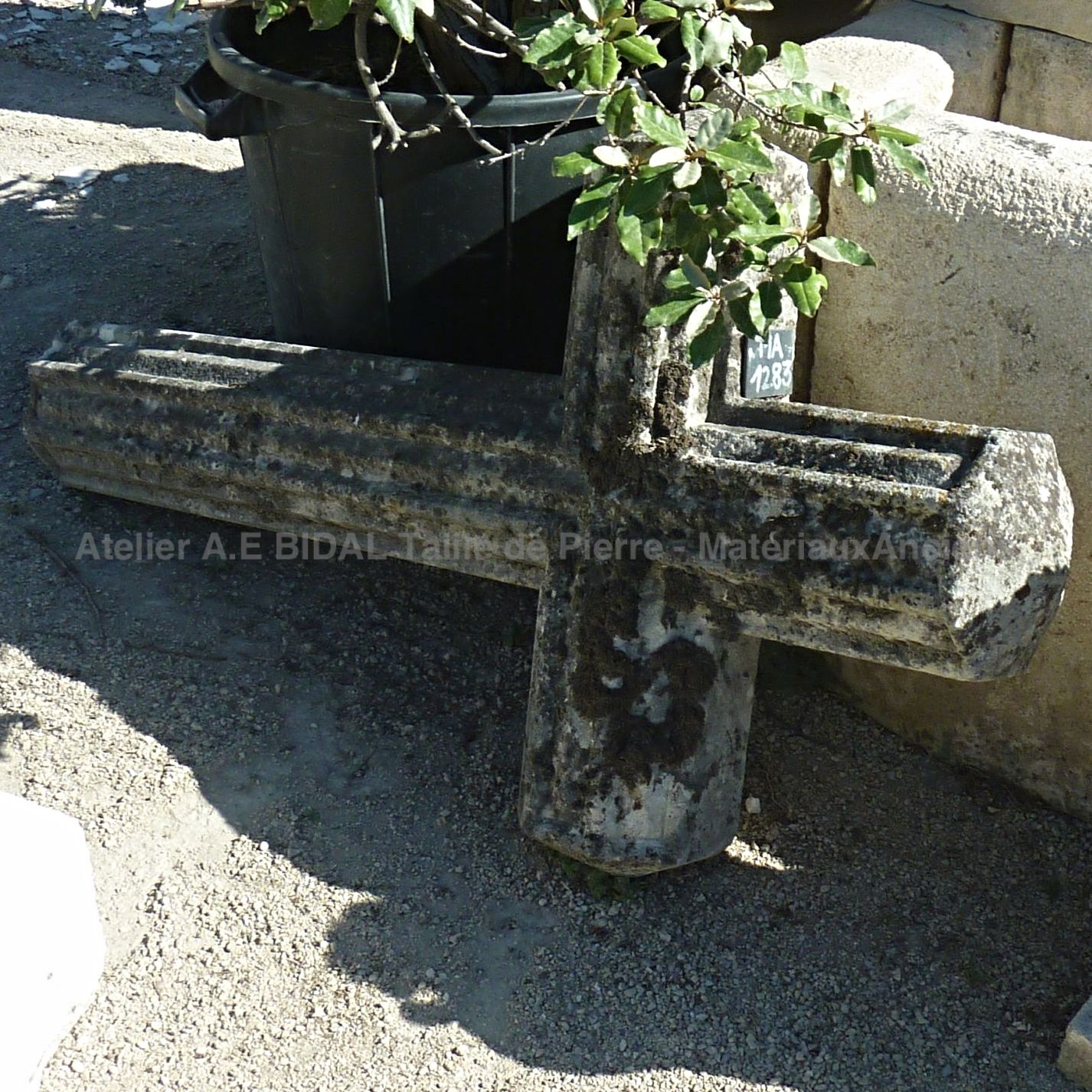Cross made of carved stone - an ancient cross one meter twenty in height.