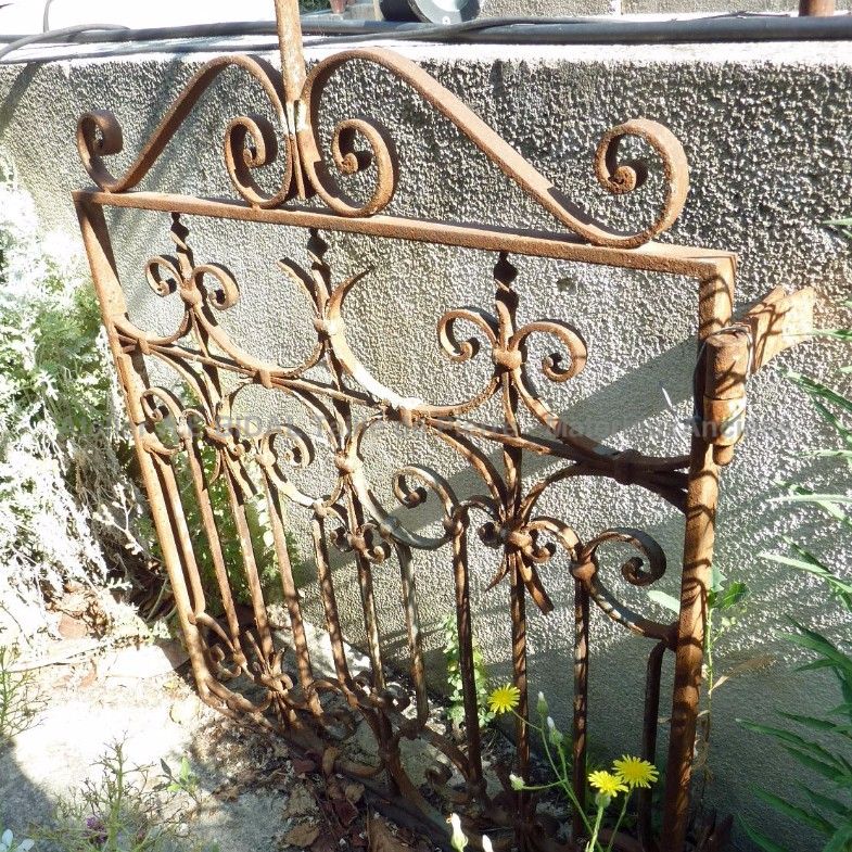 Old craftmade iron gate - a beautiful small wrought iron gate.