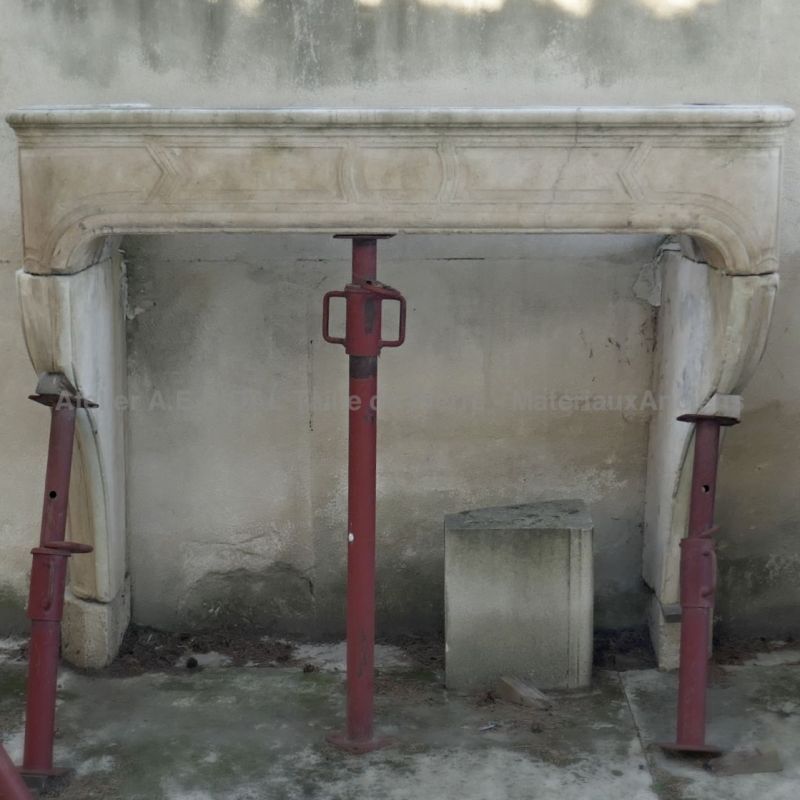 Beautiful antique fireplace - Elegant geometric mantle in natural stone.