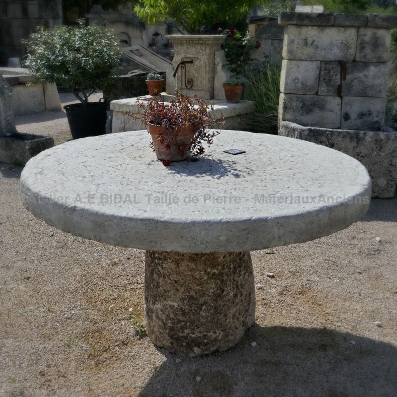 Stone garden furniture - Antique stone round table for garden - Atelier Bidal in Provence.