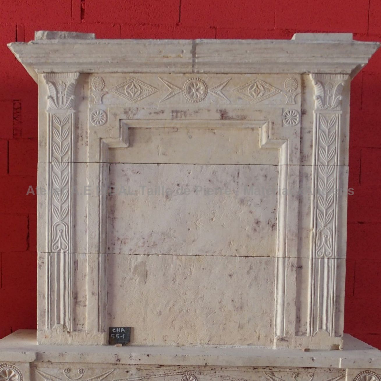 Louis XVI fireplace - traditional antique fireplace made of natural stone.