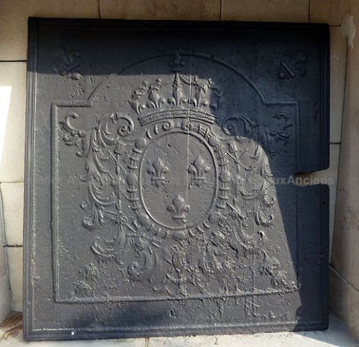 Plaque de cheminée en fonte François 1er - nos accessoires cheminée en matériaux anciens.