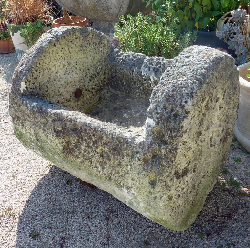Antique stone trough on sale at Alain BIDAL Antique Materials in Provence.