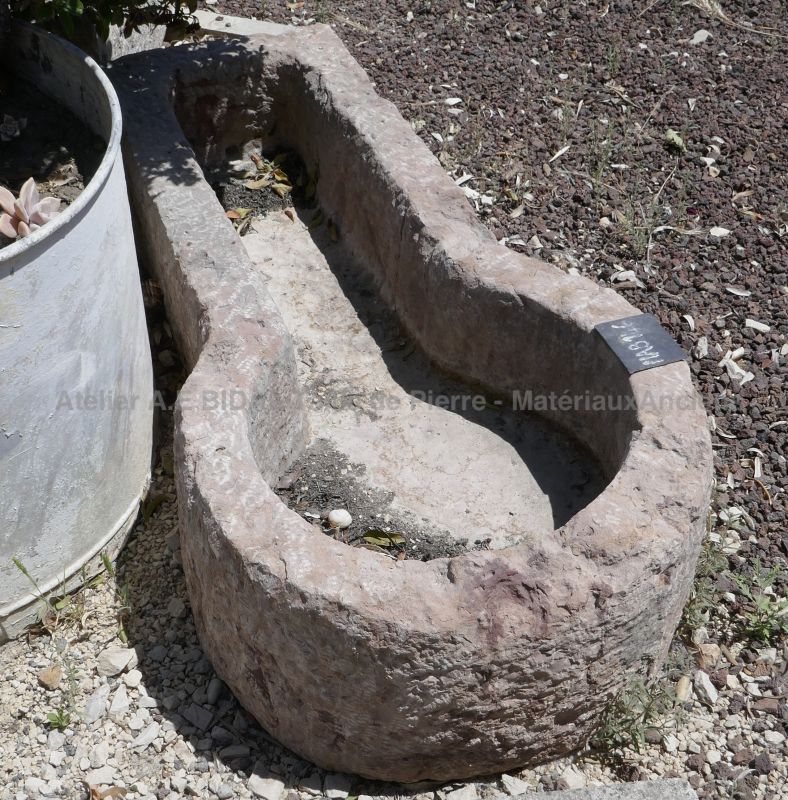 Rare and original antique trough in stone on sale exclusively at Alain Bidal Antique Materials in Provence.