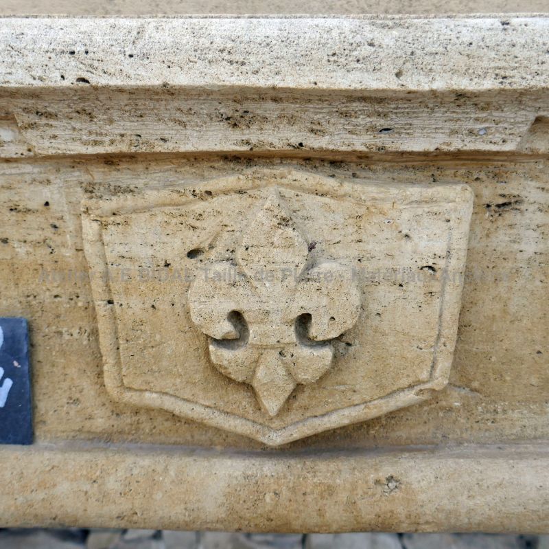 hand sculpted lily flower on an old fireplace - Louis XV.