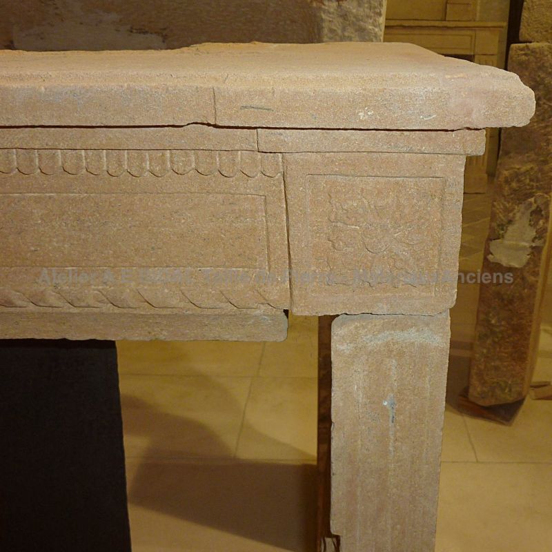 Antique fireplace in stone - Louis 14 fireplace in a yellow / gold color.