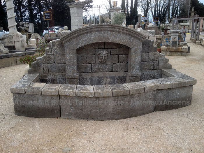 Wall fountain - a beautiful large fountain in old stones.