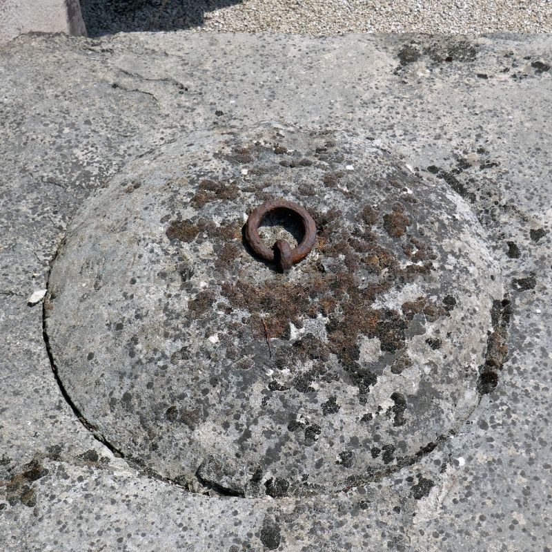 Antique stone garden wells of rustic style - old well accessory.