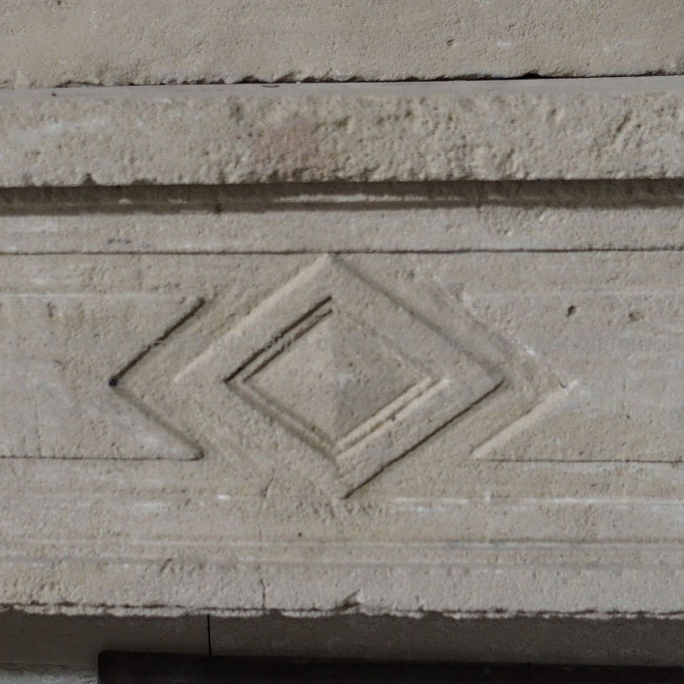 Geometric Louis 16 fireplace: diamond pattern sculpted by hand.