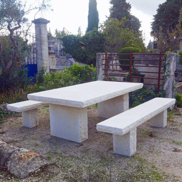 Rustic stone table and benches : a sturdy garden set by Atelier Alain Bidal (Provence)
