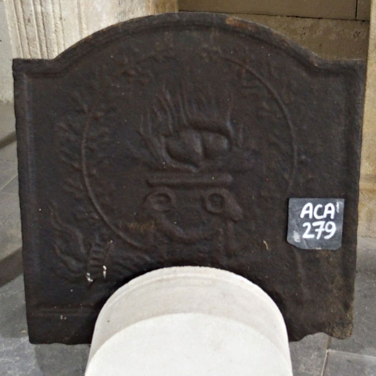 Beautiful cast iron fireback - Old cast iron fireplace accessory.