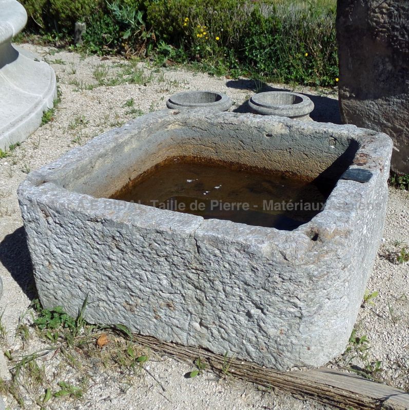 Old stone basin : reclaimed trough in weathered stone  - Atelier Alain BIDAL (Provence)