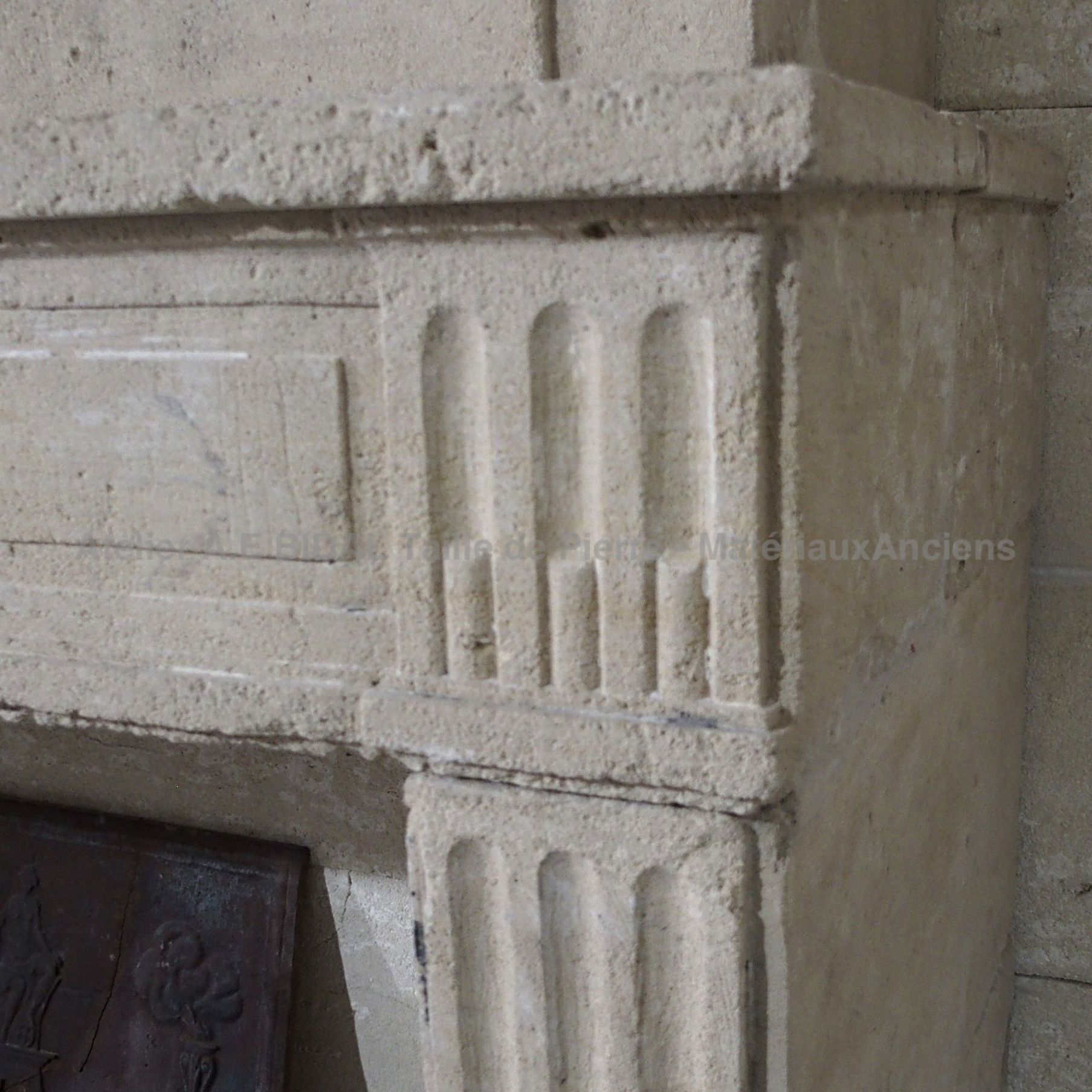 Antique Louis 16 fireplace ins tone - A fireplace with trumeau carved in natural stone.