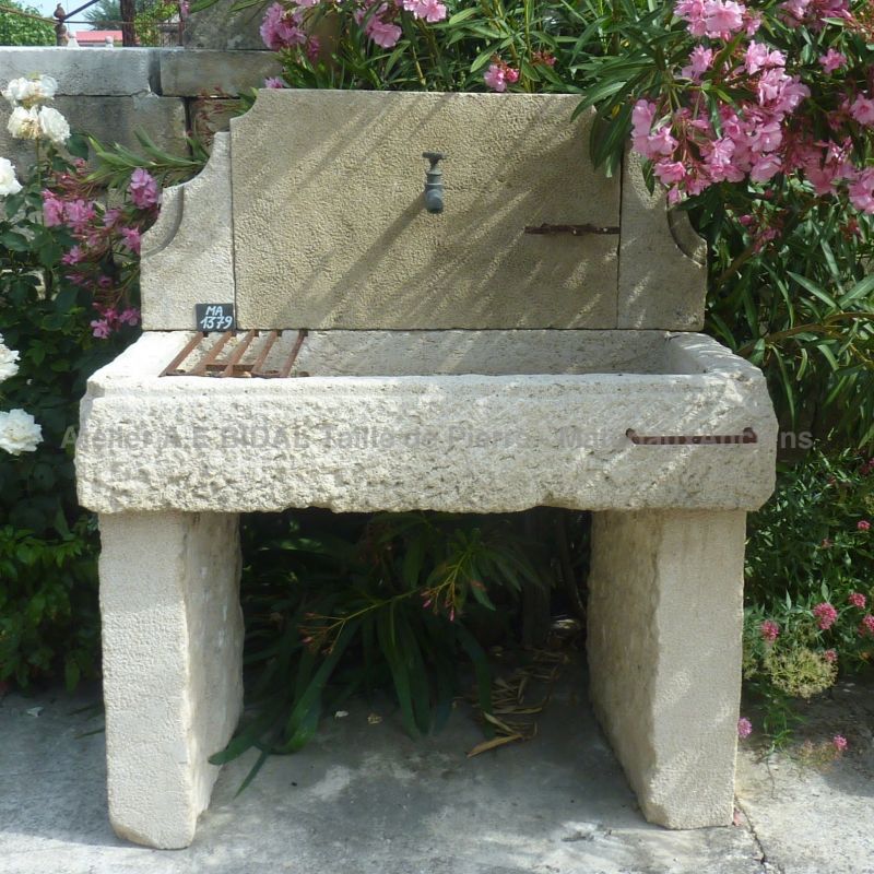 Beautiful sink in stone and other reclaimed materials | Antique stone sink for summer kitchen or garden.