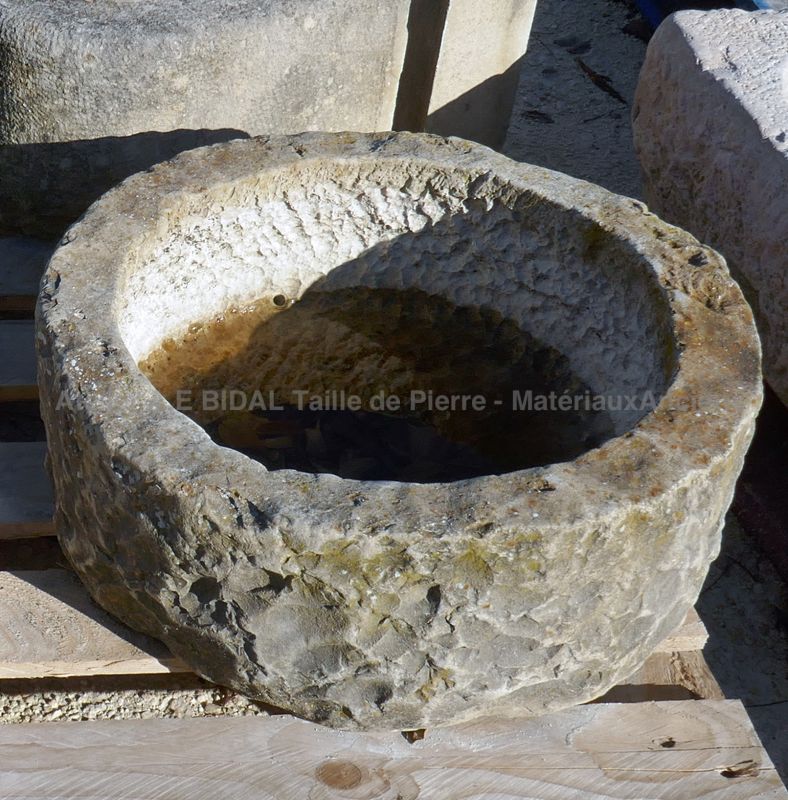 Old shallow round stone trough by Alain BIDAL Antique Materials in Provence