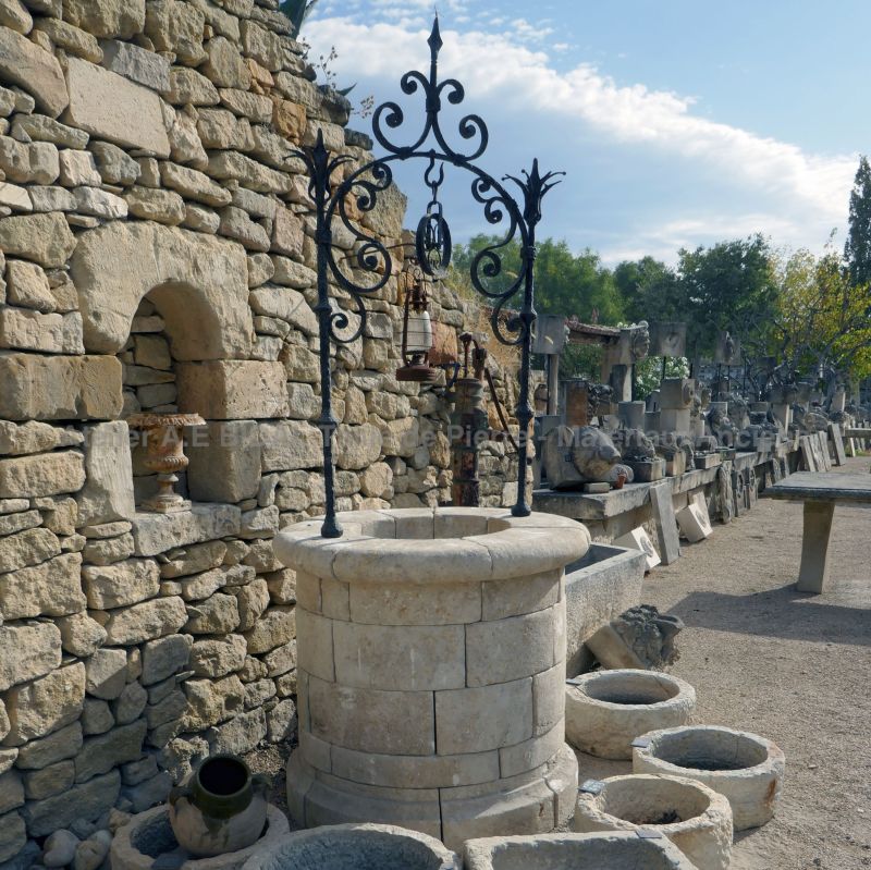 Superb circular garden well made of reclaimed materials.