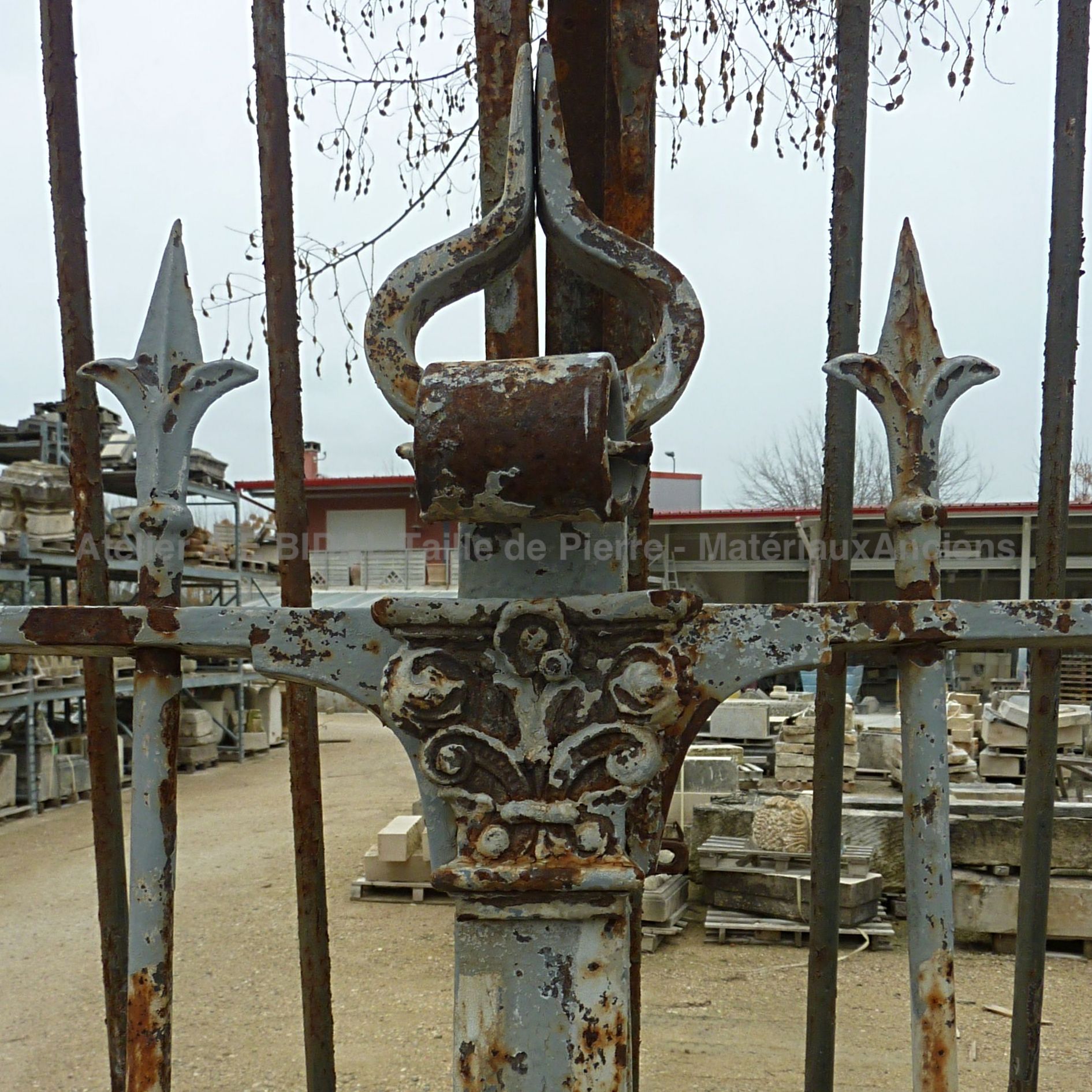 Antique riveted wrought-iron gate with two semi-openwork doors ** SOLD