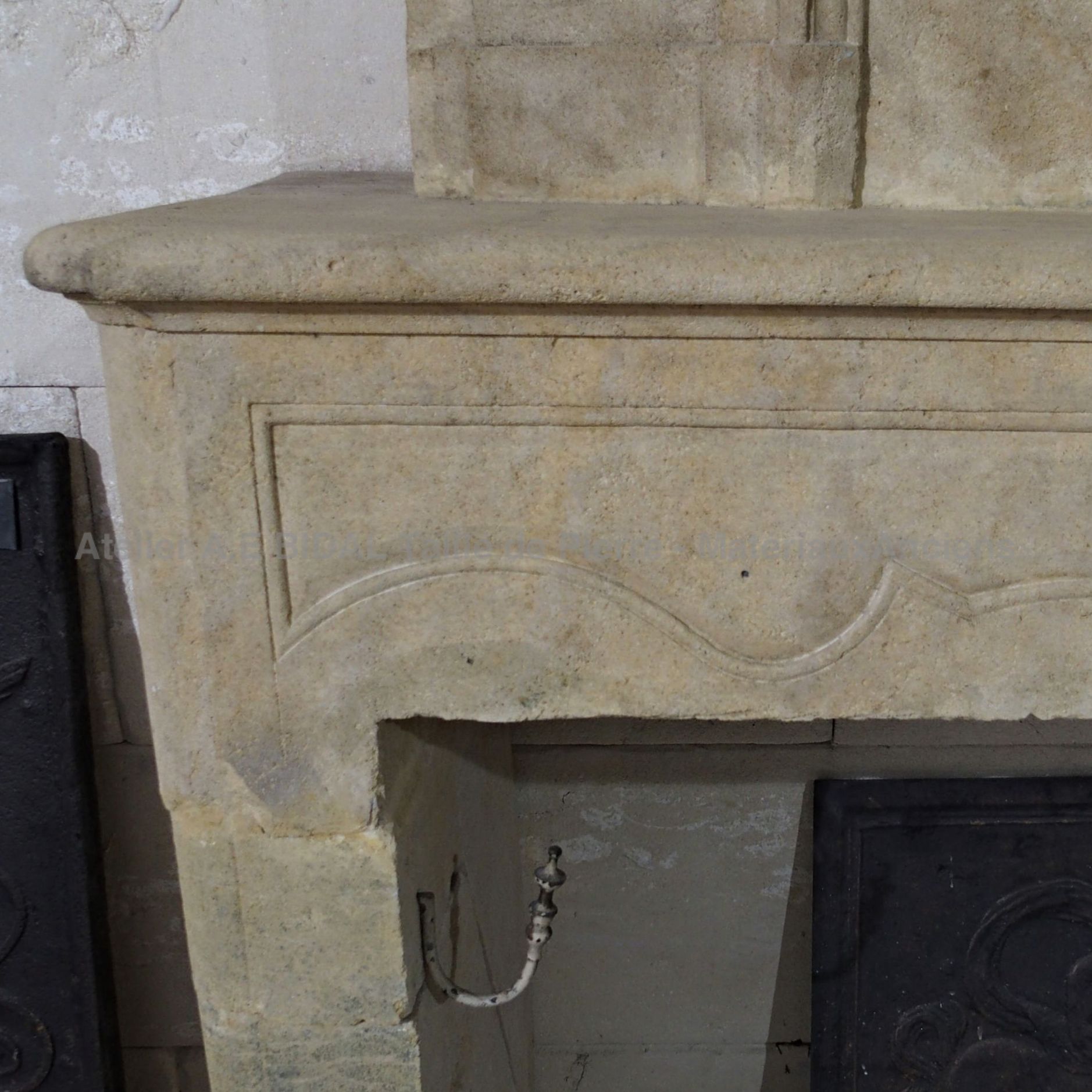 fireplace with overmantle: an old fireplace whose rather simple decor gives it a nice depth.