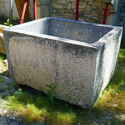Old stone trough for sale at Alain Bidal Antique Materials in Provence