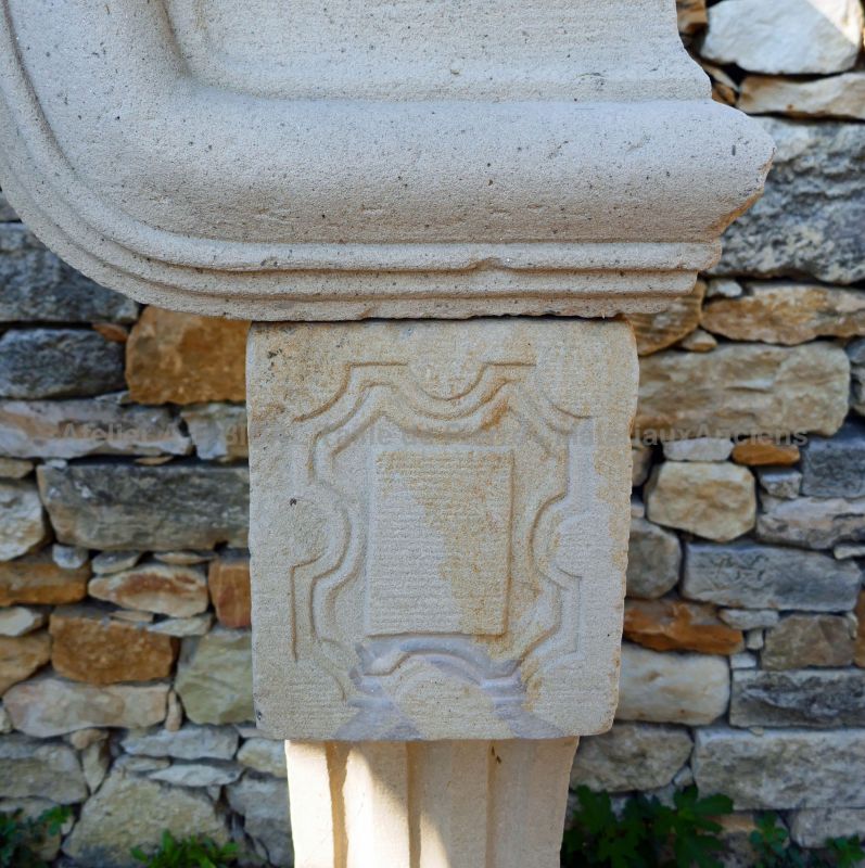 Antique Louis 14 stone fireplace - For sale at Alain Bidal Antique Materials in Provence.