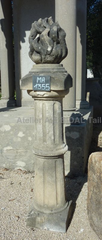 Pair of stone pilasters with flame ornements ** SOLD