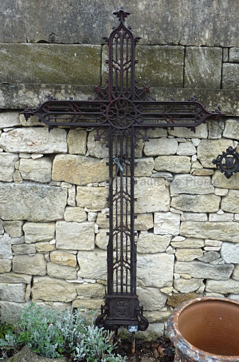 Magnificent old cross made of black cast iron - an old cross of an impressive size.