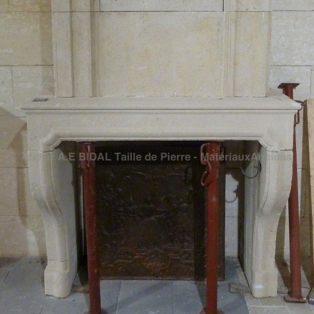 Fireplace with overmantle - an old stone fireplace.