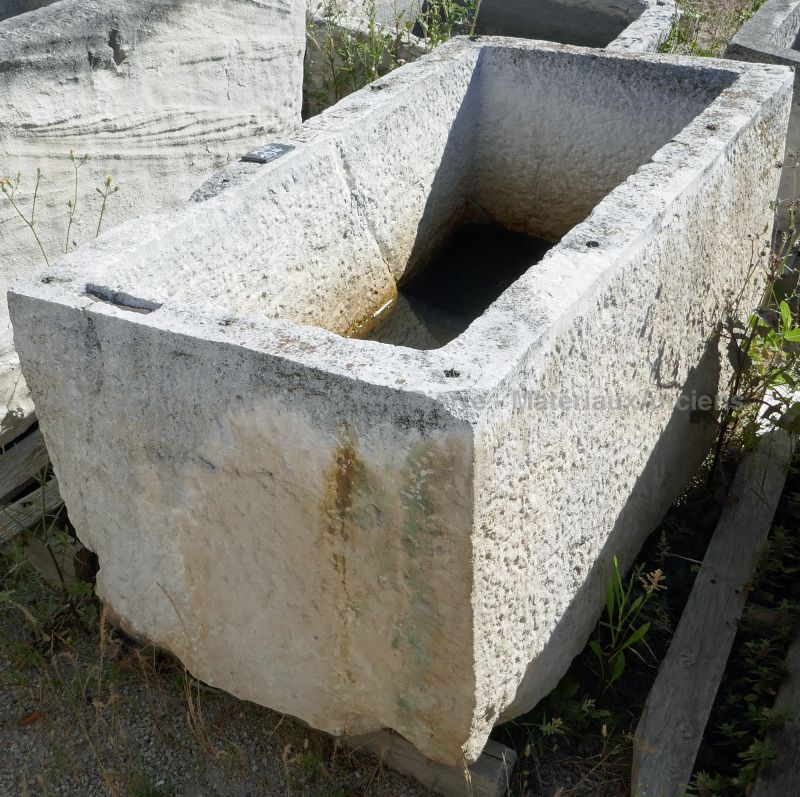 Antique decorative stone planter for the garden - rectangular hard stone trough.