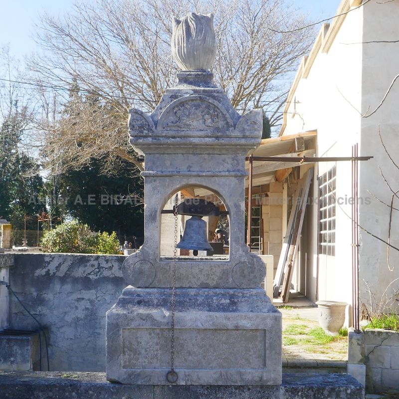 Small antique bronze bell and its bell tower in old weathered stones : Atelier BIDAL (Provence)