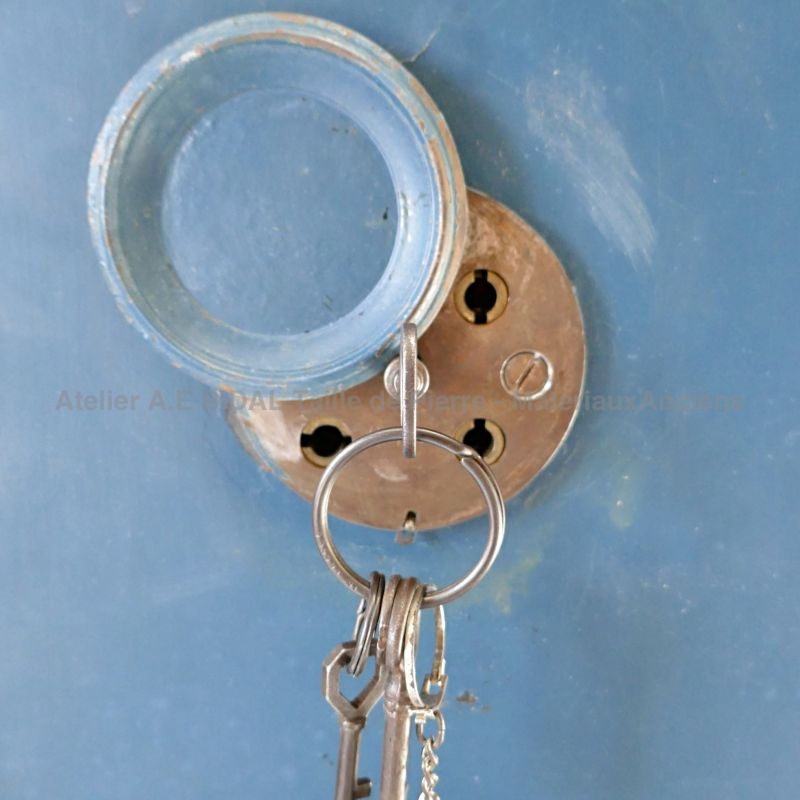 Detail of the locket and keys on our old metal safe.