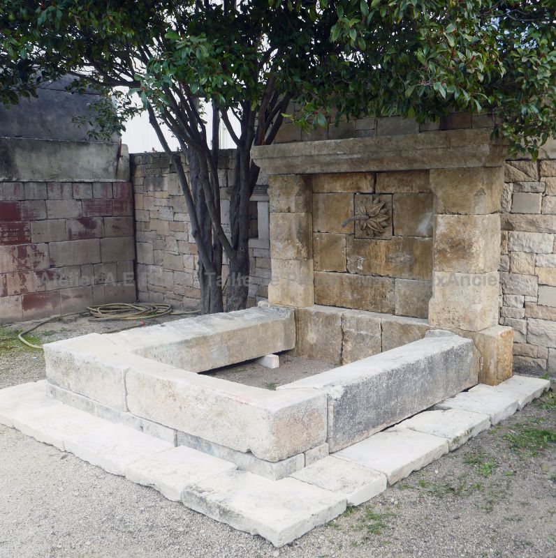 Wide choice of fountains and basins in stone to decorate your garden at Atelier Alain BIDAL in Provence