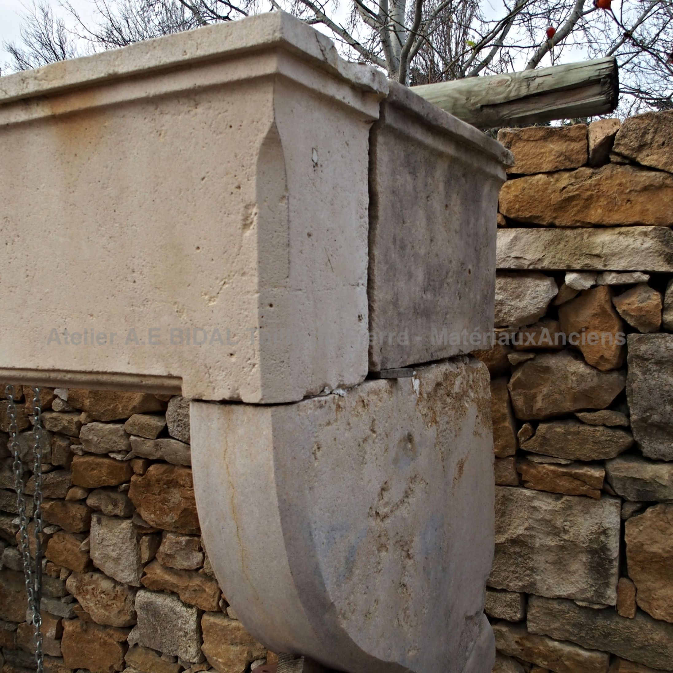 Magnificent old fireplace - an august rustic fireplace for a large home.