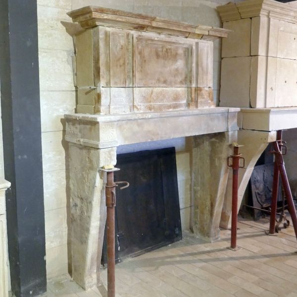 Antique Louis XVI style stone fireplace for sale at Alain Bidal's - Provence