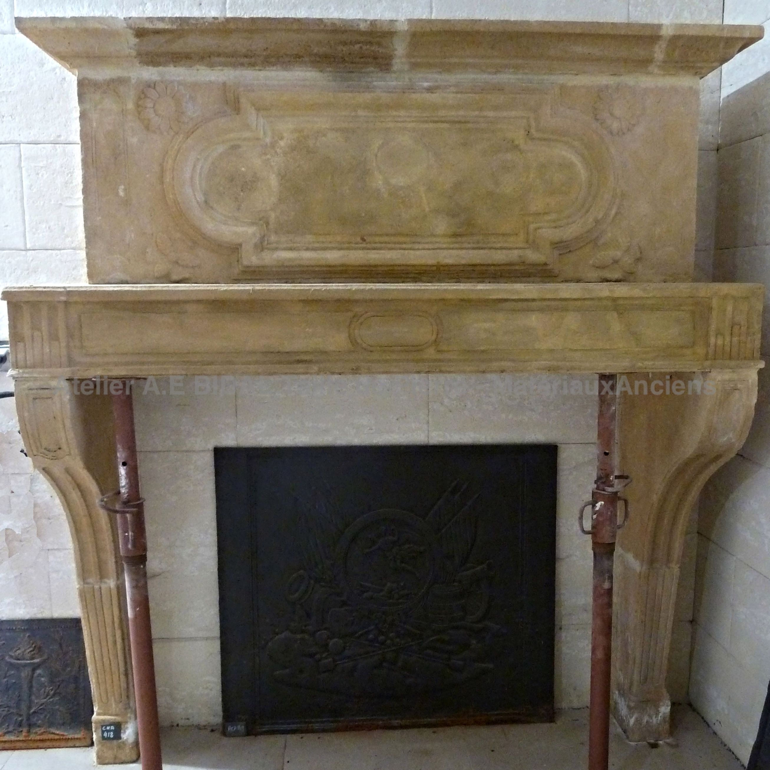 Fireplace wioth overmantle of a yellow bronze color absolutely beautiful - old fireplace.
