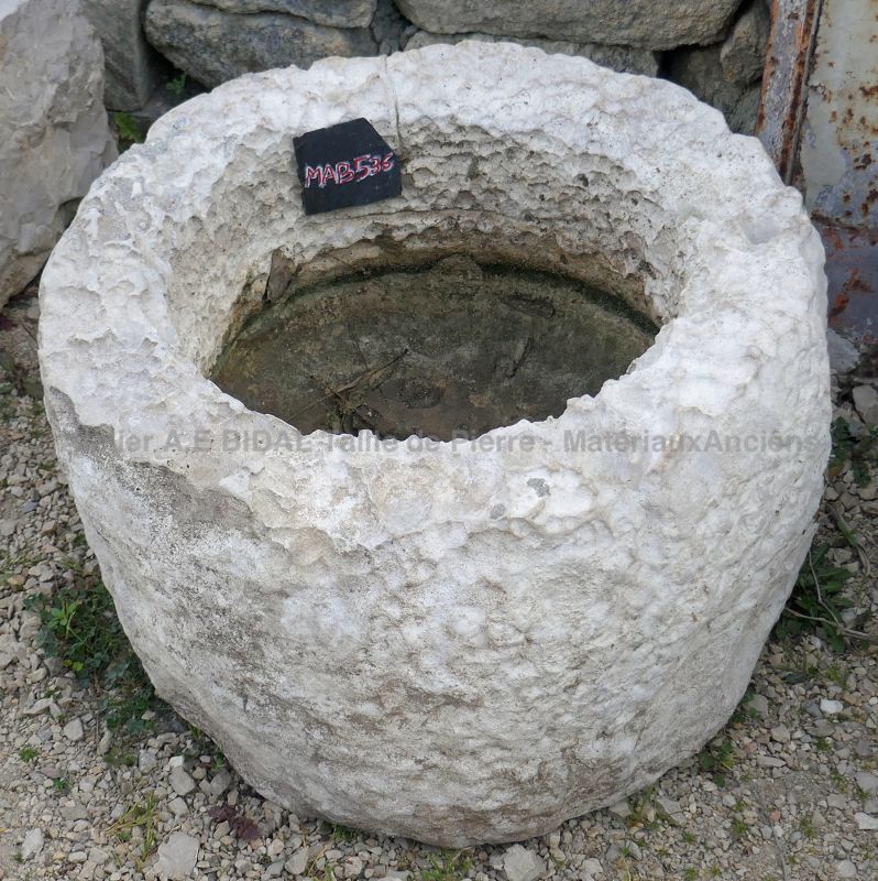antique trough in stone : small round trough by The Antique Materials in Provence Alain BIDAL