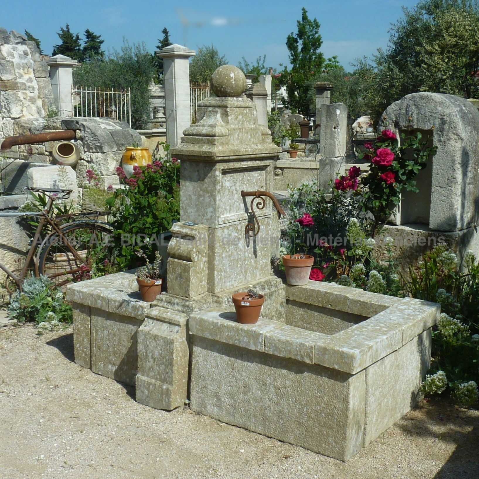 Garden fountain in old stones | A fountain of Provence in natural stone on sale at Alain BIDAL