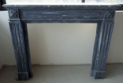 Antique grey marble mantel on sale at Alain Bidal's Antique Materials, Ilse sur la Sorgue (Provence).